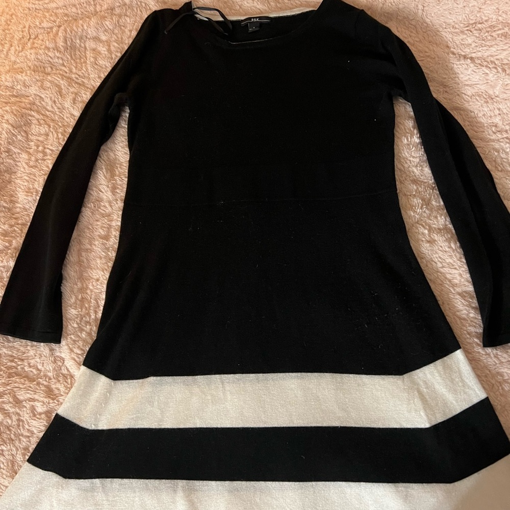 Medium length dress. Great with tights and boots at winter time.